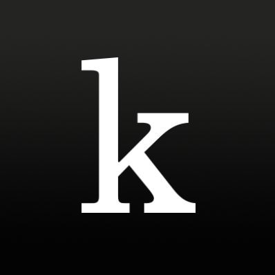 A white lowercase letter "k" in a serif font is centered on a black gradient background. Kanopy logo