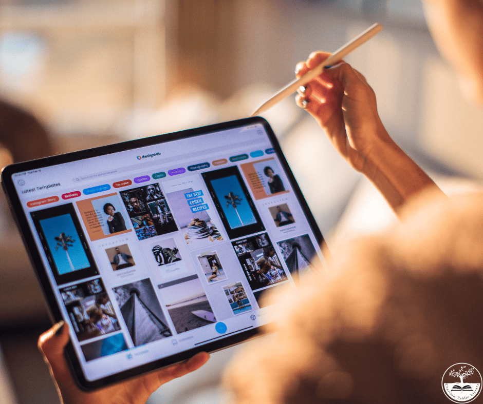 a person uses a stylus to browse photo galleries on a tablet, which displays a grid of various images and graphic designs.
